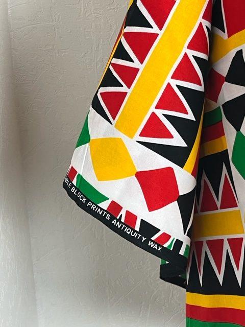 Tissu traditionnel africain Wax rouge noir vert jaune blanc